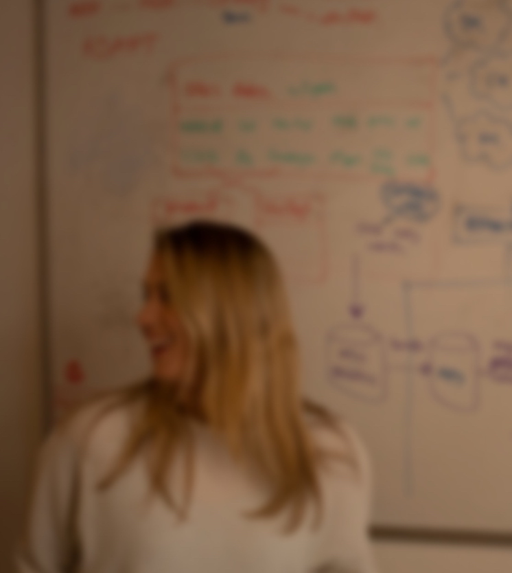 ADSP Employee At Whiteboard